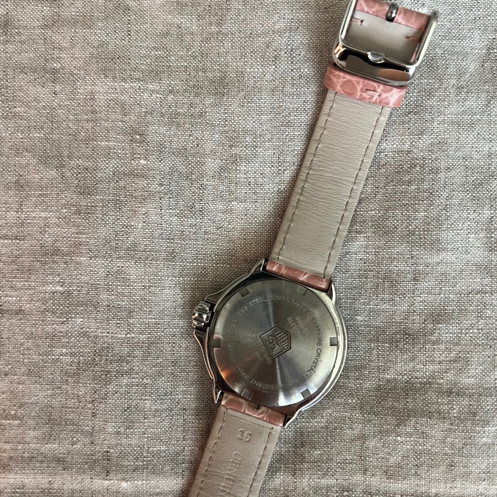 Tag watch with diamonds